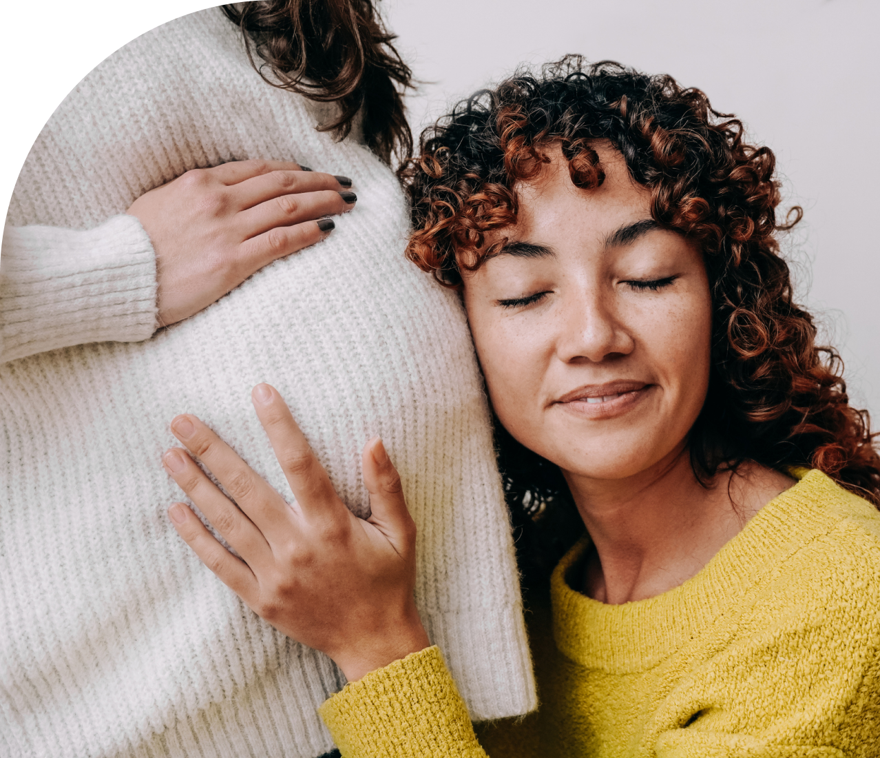 woman with a surrogate on a surrogacy journey